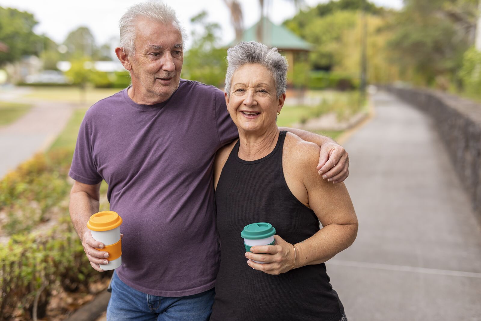 Couple enjoying morning walk after cardiology consultation